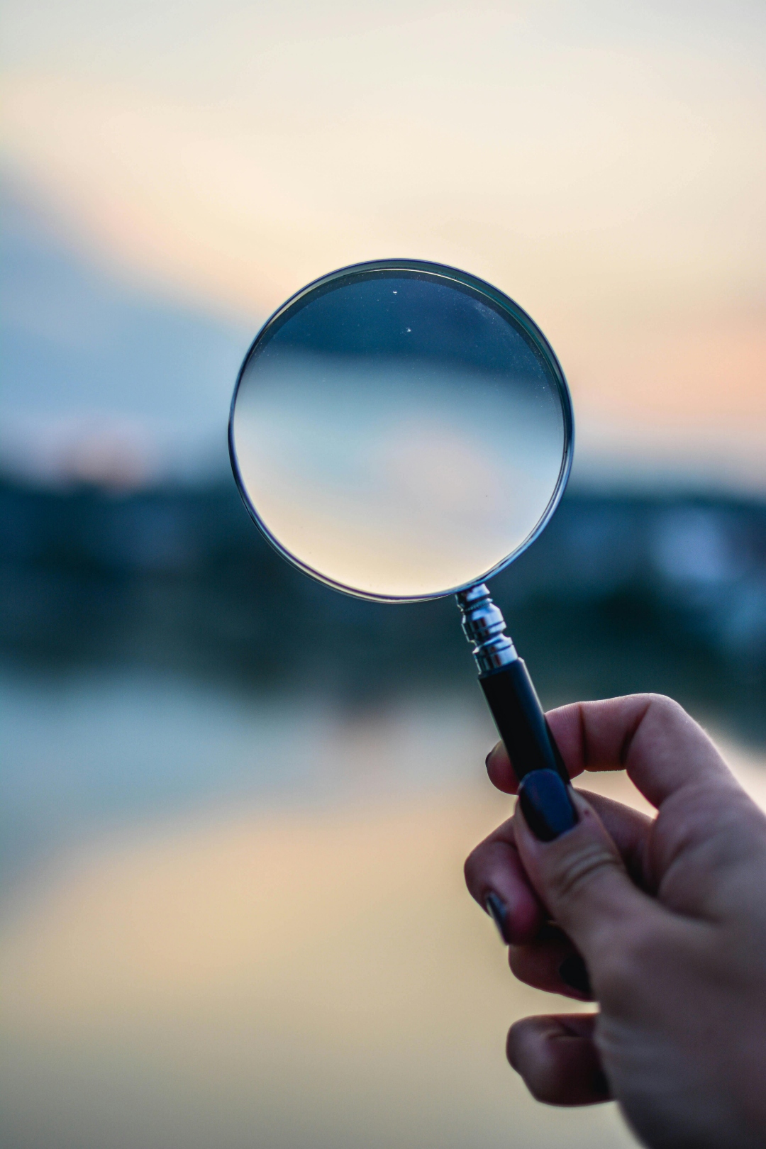 Magnifying glass over documents — public records transparency